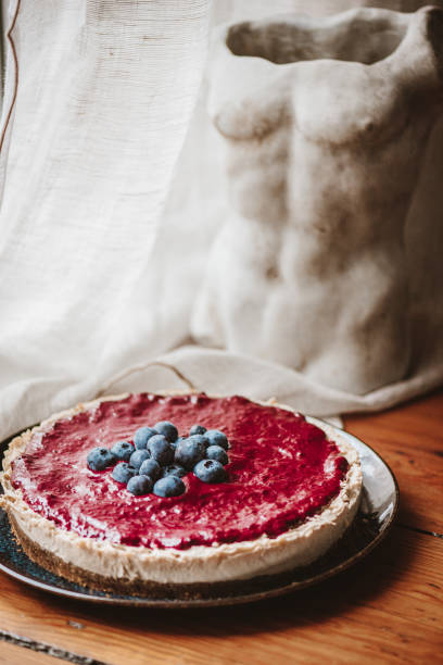 istock Vegan Cheesecake with Blueberry Sauce 1319588268