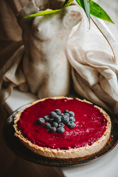 istock Vegan Cheesecake with Blueberry Sauce 1319588744