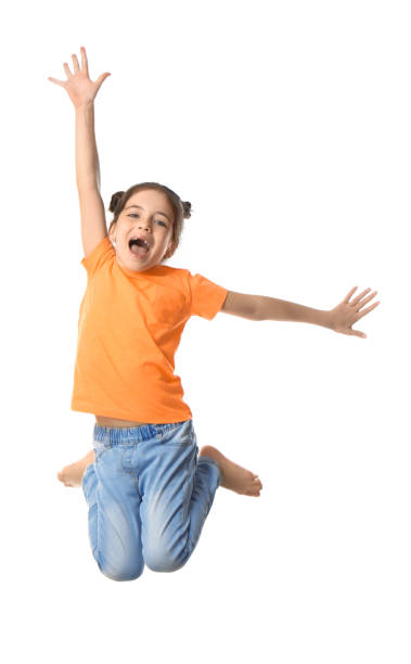 istock Cute little girl jumping on white background 1319589672