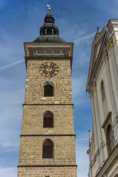 Black tower and facade of the cathedral in Ceske Budejovice Black tower and facade of the cathedral in Ceske Budejovice, Czech Republic cesky budejovice stock pictures, royalty-free photos & images