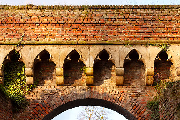 Ornamented Brick Arch An old ornamented brick arch in Zons, Germany. feste zons stock pictures, royalty-free photos & images