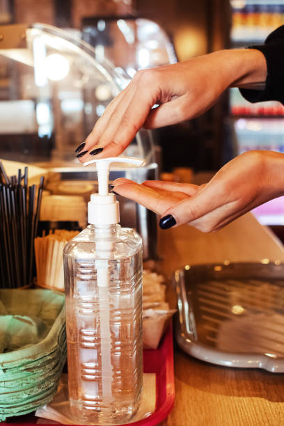 istock A sanitizer is on the bar in a cafe. Hands should be cleaned before servicing. Quarantine due to virus covid 19. Service in a pandemic. Female hands use alcohol gel. 1319601497