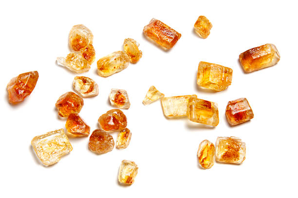 istock Brown Sugar Crystals Isolated On White 131960388