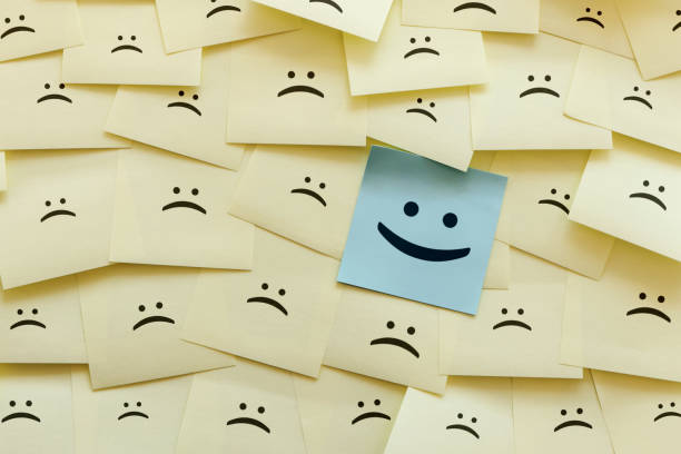 istock Standing Out From The Crowd With Smiling Hexagon 1319606289