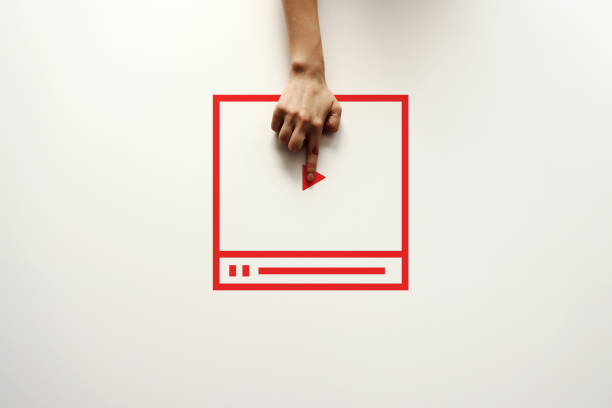 Video Marketing Concept.Hand pressing transparent red button