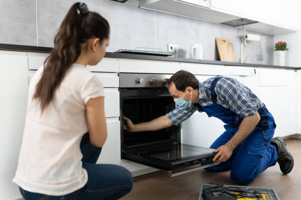 istock Kitchen Appliance Oven Repair By Handyman Technician 1319611040