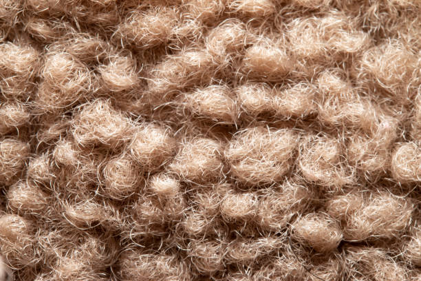 istock Beige boa fleece close-up, background material 1319613700
