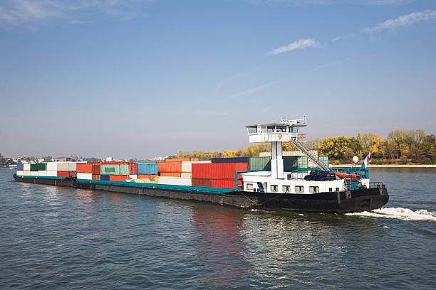 Freight Ship Freight ship on Rhine River, Germany barge stock pictures, royalty-free photos & images