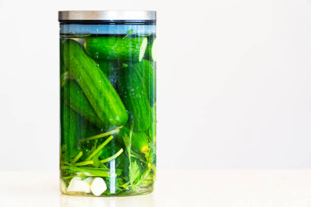 istock Pickled cucumbers in a glass jar 1319616436