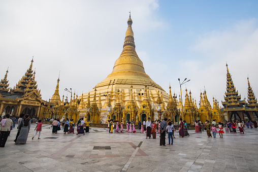 YANGON, MYANMAR - MAR 07, 2017: Atmosphere inside the temple at Shwedagon pagoda . A  pagoda that symbolize the spiritual and famous tourist attraction in Yangon, Myanmar