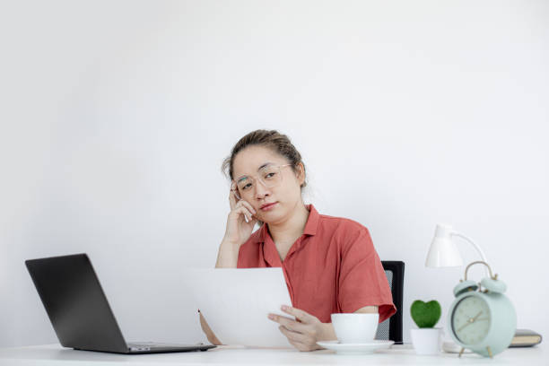istock Asian female student is working on a question from a teacher, she is studying online as the university has opened up online teaching and learning due to the COVID-19 outbreak. Online learning concept. 1319622811