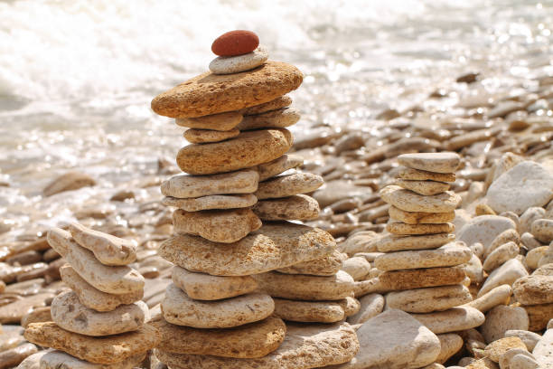 istock A pyramid made of oval stones. 1319622818