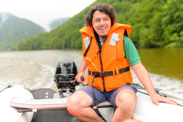 istock Man Driving the Motorboat 1319623825