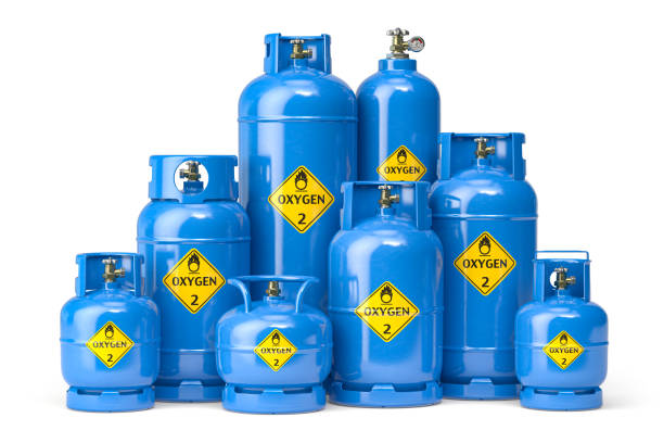 istock Oxygen gas tanks containers and cilinders of different size isolated on white. 1319625390