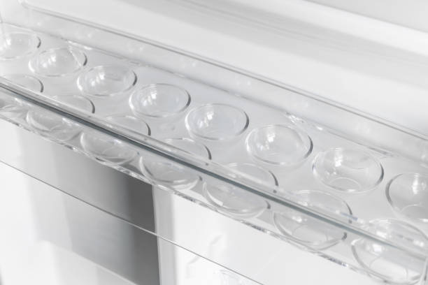 istock inside of clean and empty refrigerator with shelves. Close up. 1319627084