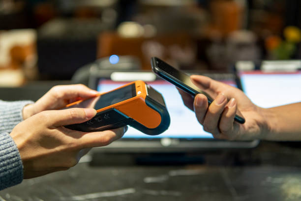istock Payment with smartphone on credit card payment machine 1319628662