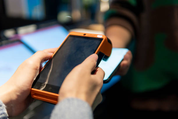 istock Payment with smartphone on credit card payment machine 1319628722