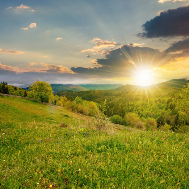 Photo of rural mountain landscape in spring at sunset