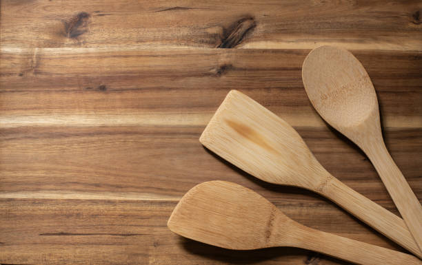 istock a group of wooden spoons on a cutting board 1319631523