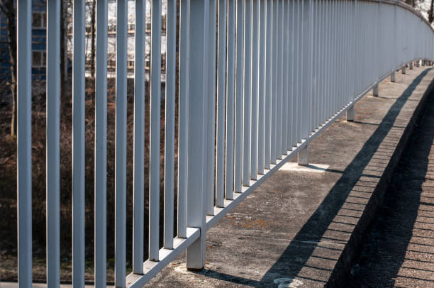 istock a white painted metal railing at a footbridge 1319631527