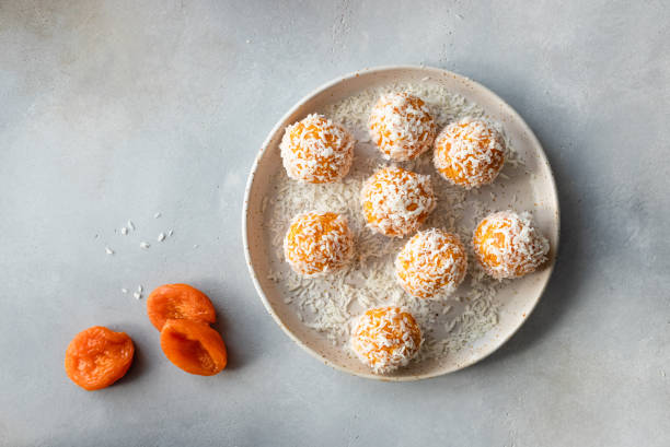 vegan energy balls in ceramic plate stock photo
