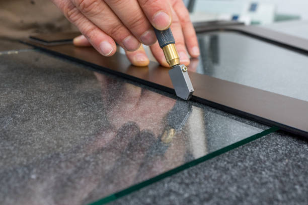 The Glazier Cuts The Glass With A Handheld Cutting Tool Handicraft Plant  Close Up Stock Photo - Download Image Now - iStock
