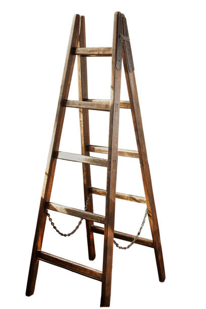 Wooden ladder isolated on white background. Double ladder with a chain in the middle stock photo