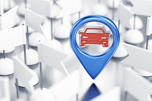 A blue colored location pointer with a car pictogram in surrounding of white pennants which are arranged on reflective surface. 3D rendering graphics on the theme of Car Sharing Services.