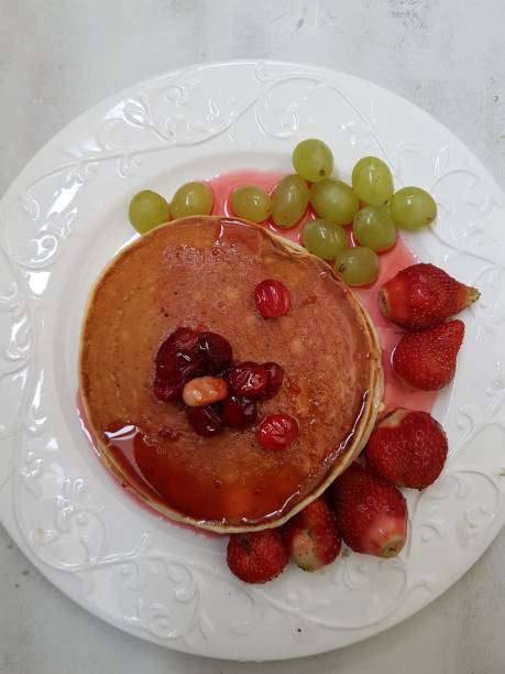 istock Pancakes with strawberries 1319644408