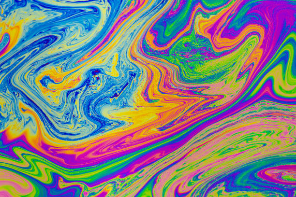 istock Psychedelic multicolored patterns background. Photo macro shot of soap bubbles 1319645891