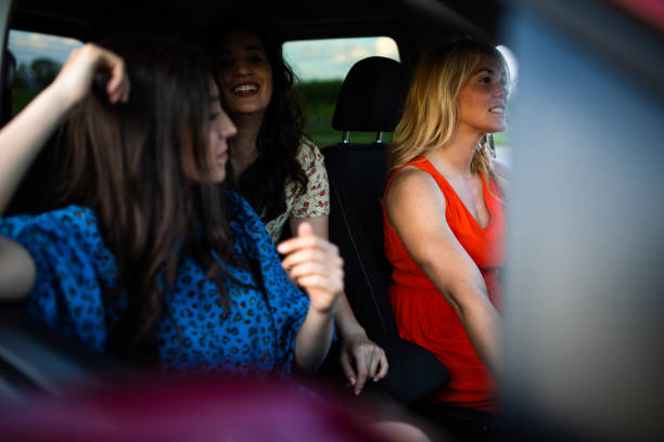 istock Young women talking in a car 1319649985
