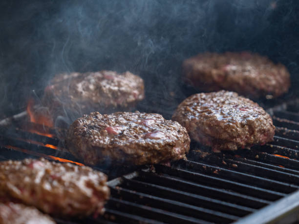 istock Grilling Burgers 1319654277