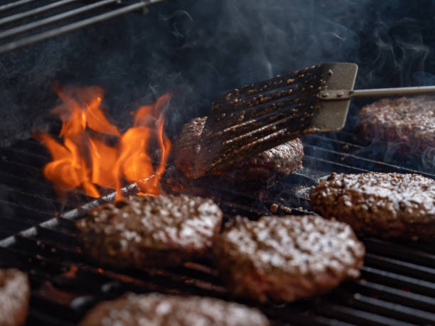 istock Grilling Burgers 1319654284
