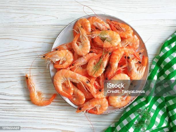 Boiled Shrimp In A Plate On A Wooden Background Stock Photo - Download Image Now - Ebi Nigiri, Plate, Directly Above