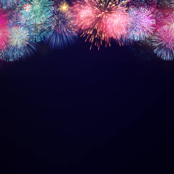 istock Fireworks explode at the top side. The copy space at below on dark background 2 1319654935