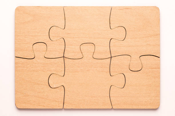 istock Six elements of a wooden puzzle connected. 1319659034