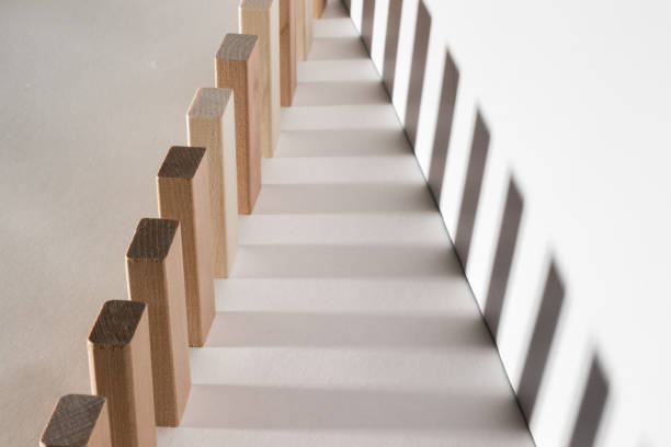 istock Wooden blocks in a row. Geometric shapes from light and shadow. Illusion, concept. 1319659798