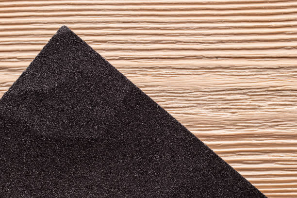 istock A sheet of sandpaper on a wooden surface 1319659842