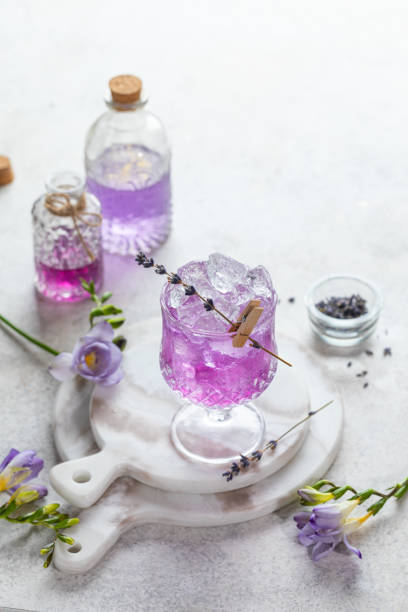 istock Lavender cocktail on a vintage white background, selective focus 1319662140