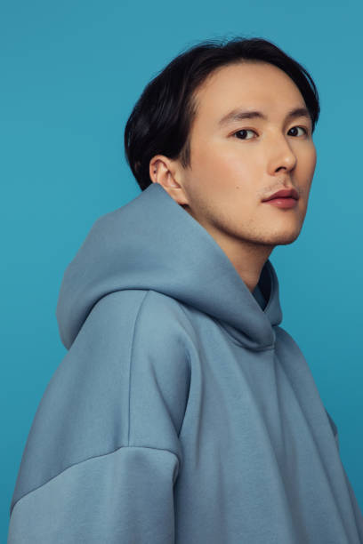 istock Emotional asian man wearing hoodie 1319662430