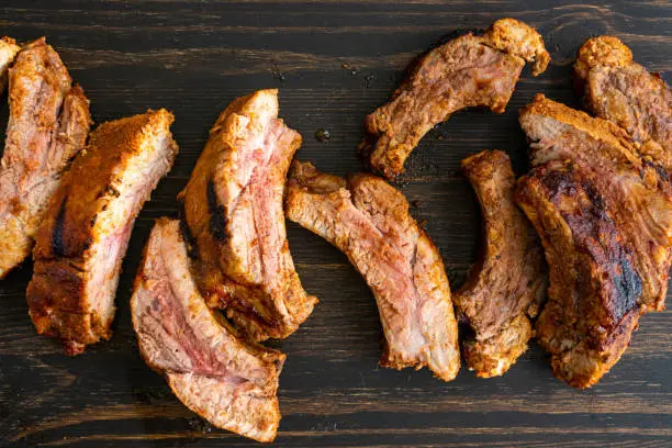 Pork  back ribs on a dark wood background