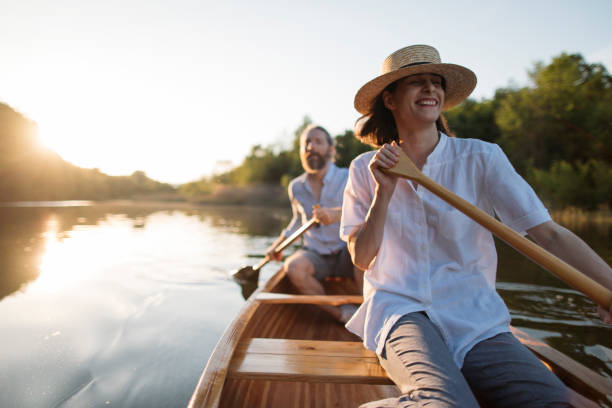 istock Couple enjoying a canoe ride 1319671023