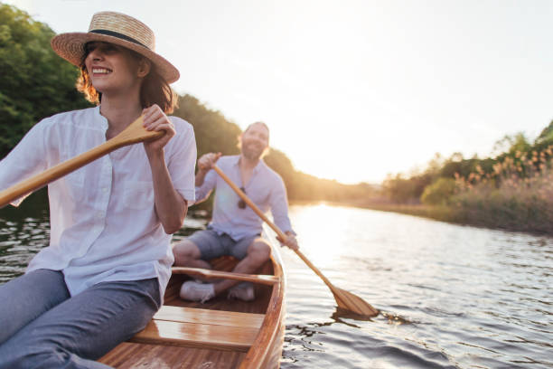 istock Couple enjoying a canoe ride 1319671096