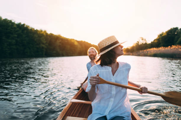 istock Couple enjoying a canoe ride 1319671175