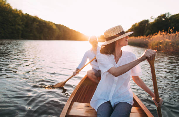 istock Couple enjoying a canoe ride 1319671179