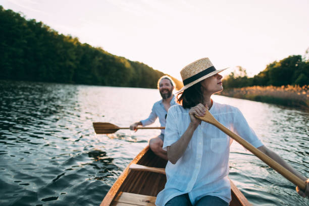 istock Couple enjoying a canoe ride 1319671203