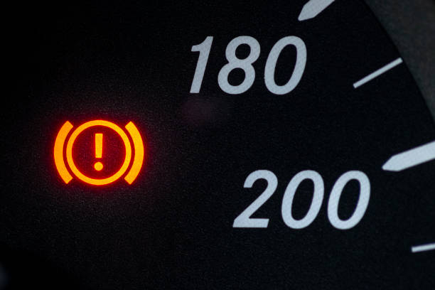 istock Warning light for brake system Did you forget to release the handbrake? 1319671698