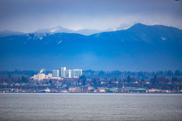 Winter View of City of Everett Washington From Puget Sound Winter View of City of Everett Washington From Puget Sound everett washington state stock pictures, royalty-free photos & images