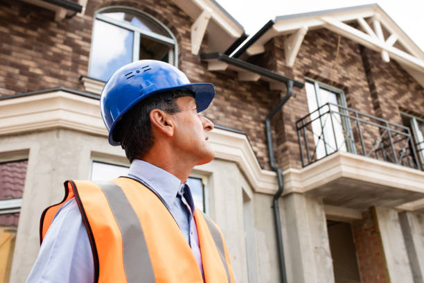 istock senior man worker on the construction site. construction worker wear safety helmet. 1319674484