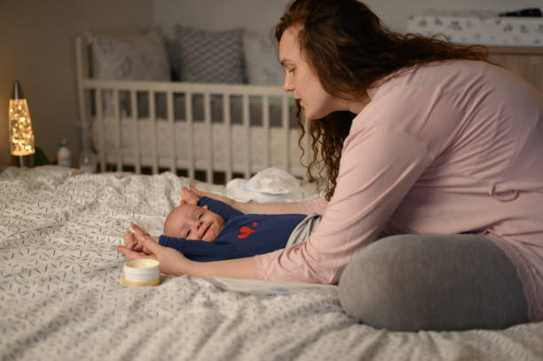 istock Mother bonding with her baby 1319675307